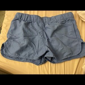 Blue running shorts with pockets